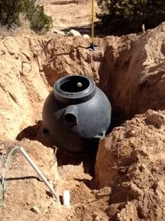 This 300-gallon residential grey water tank and a separate rainwater harvesting tank provide primary sources of irrigation for 200+ native trees and shrubs that grow along slopes at the La Resolana Partners project.