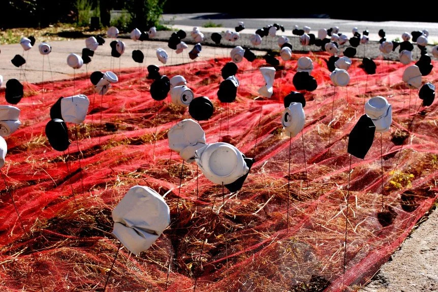 Red tulle and cans in the living canvas demonstration space.