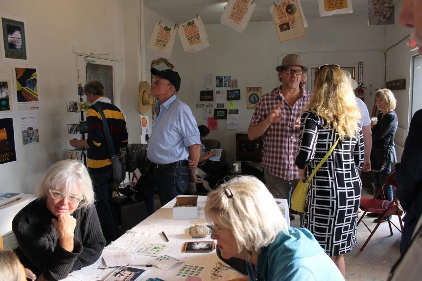 A lively crowd. People could purchase postcards that David had made and addressed to local congress people. Many gathered around tables and wrote on the post cards, asking their representatives and senators, “What legacy will you leave?”