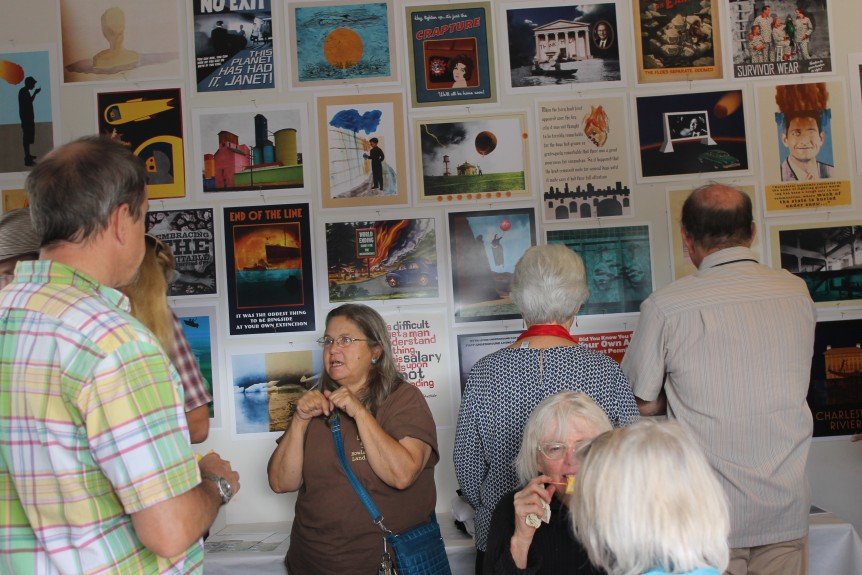 Event participants enjoying David’s posters.