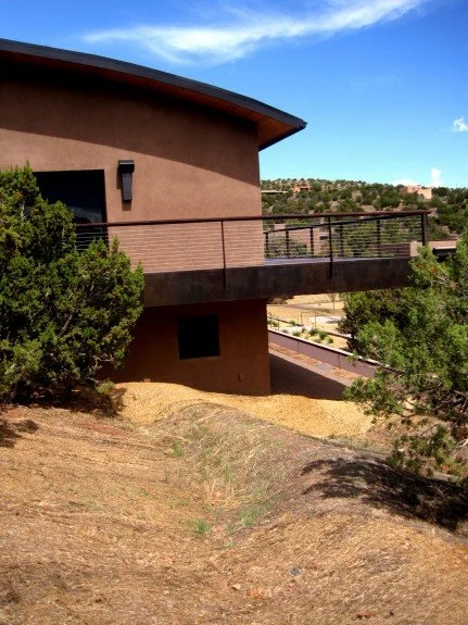 Berms and swales slow and direct surface water runoff to support vibrant germination and productive vegetation.