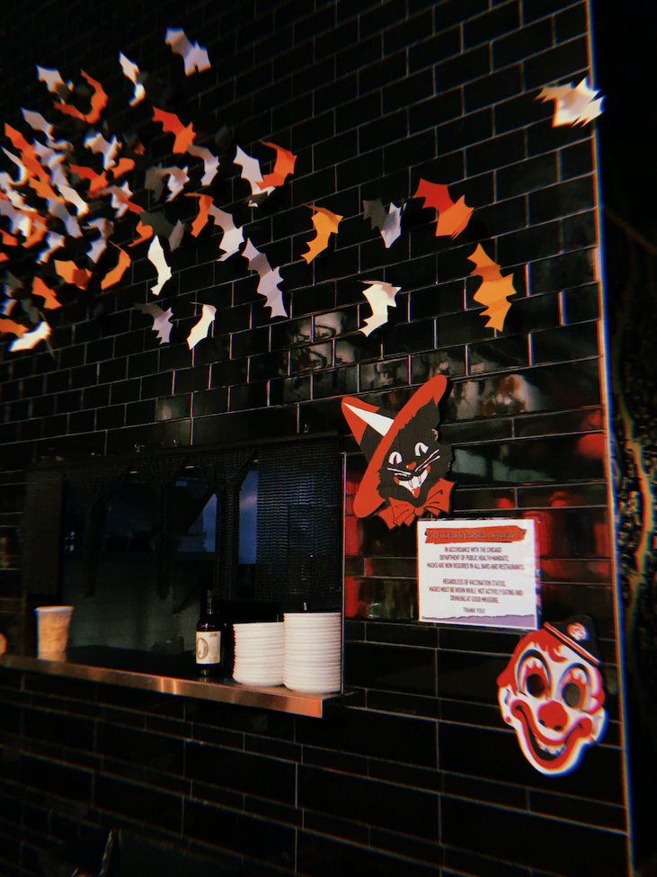 Halloween install for Good Measure Chicago : Cardstock bats, retro Halloween masks constructed out of cardboard