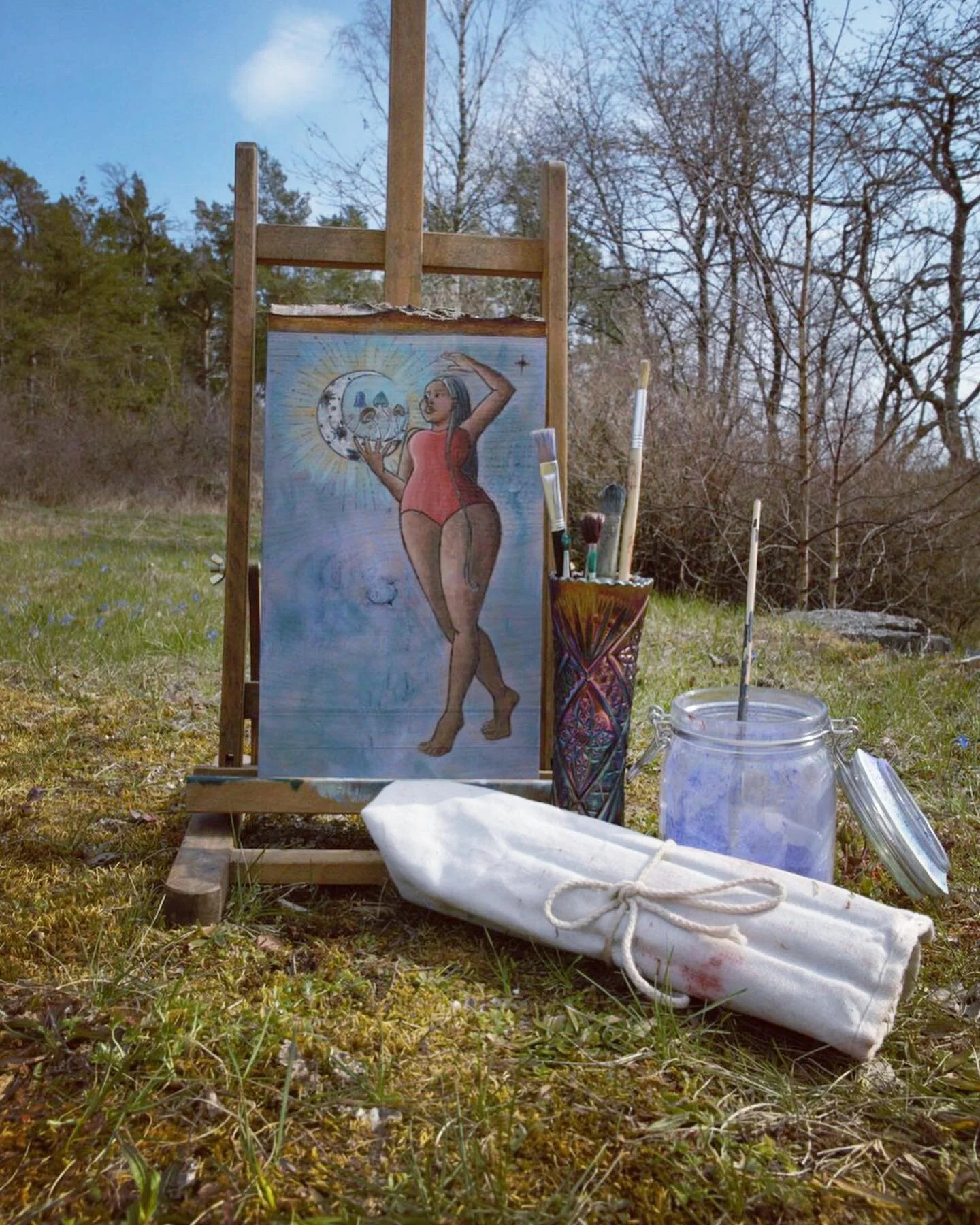 A beautiful small wooden tableau with the Moon Goddess Sela wandering in the twilight sky. She balances a waxing crescent moon in her right hand.
From the crescent moon's shining rays of power grow magical mushrooms of different colors.

A waxing cre