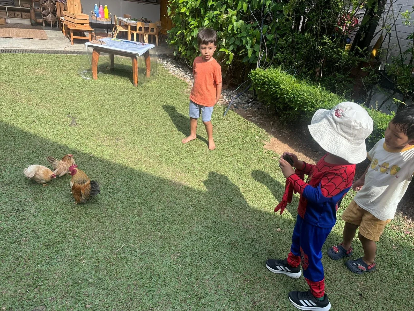 Nurtured Nest children taking photo