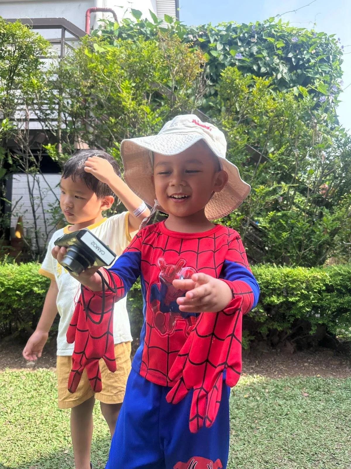 Nurtured Nest children taking photo