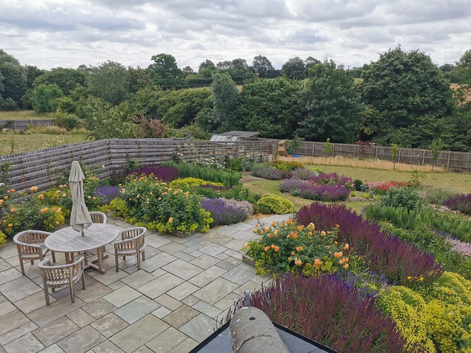 main patio and feature perenial beds.jpeg