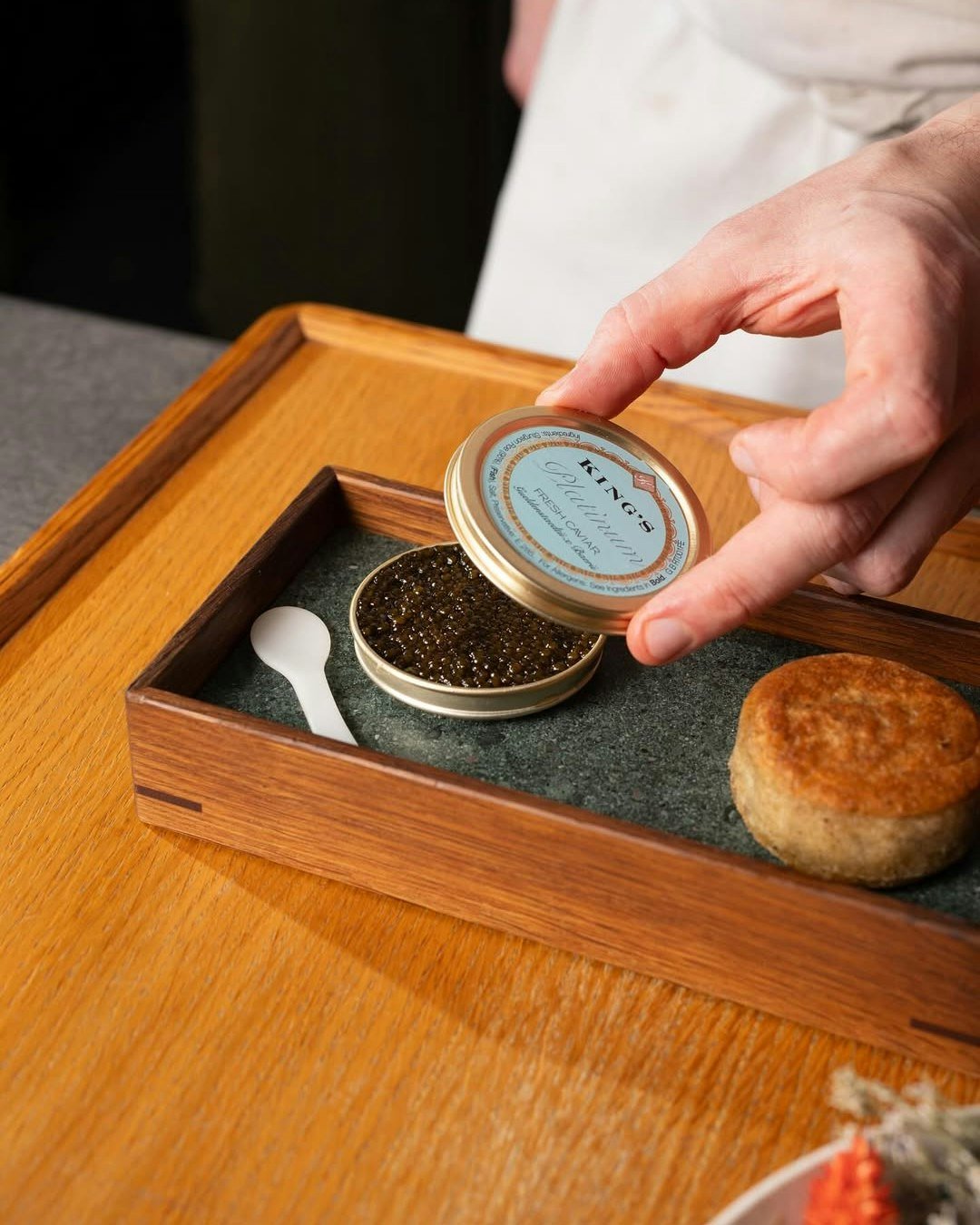 A match made in snack heaven: a collaboration between @kingsfinefood1 and the talented team at @cailbruich, served on a custom-made @rewthink presentation box crafted from fumed European oak and Cumbrian stone ✨ 

📸 @cailbruich @kingsfinefood1