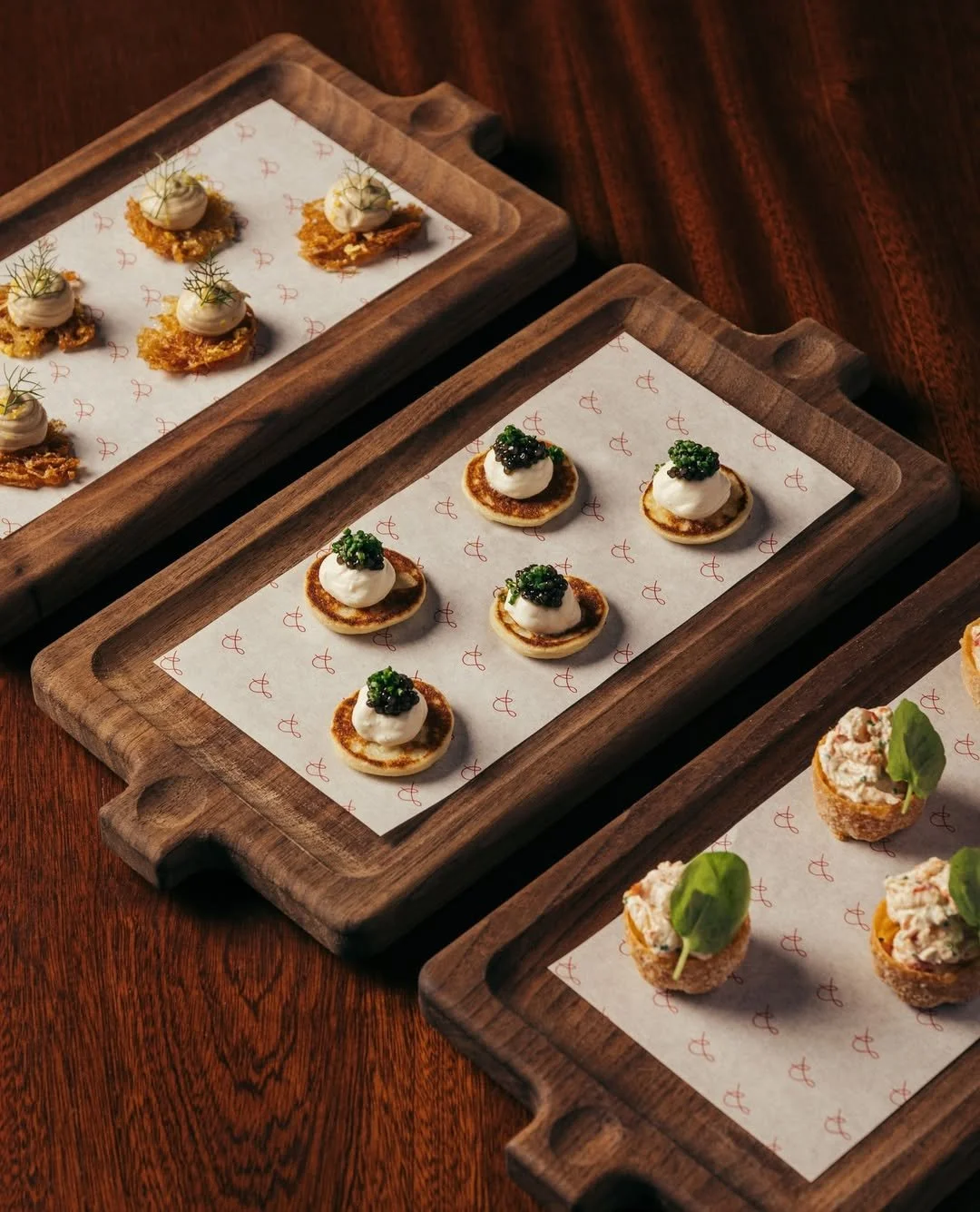 Bite size treats, ready for service at The Spence! ✨ 

We designed and made these serving boards from American walnut in our Kent workshop, adding our distinctive 'fingerprint' handles that make them exceptionally easy to pick up and grip.

The board