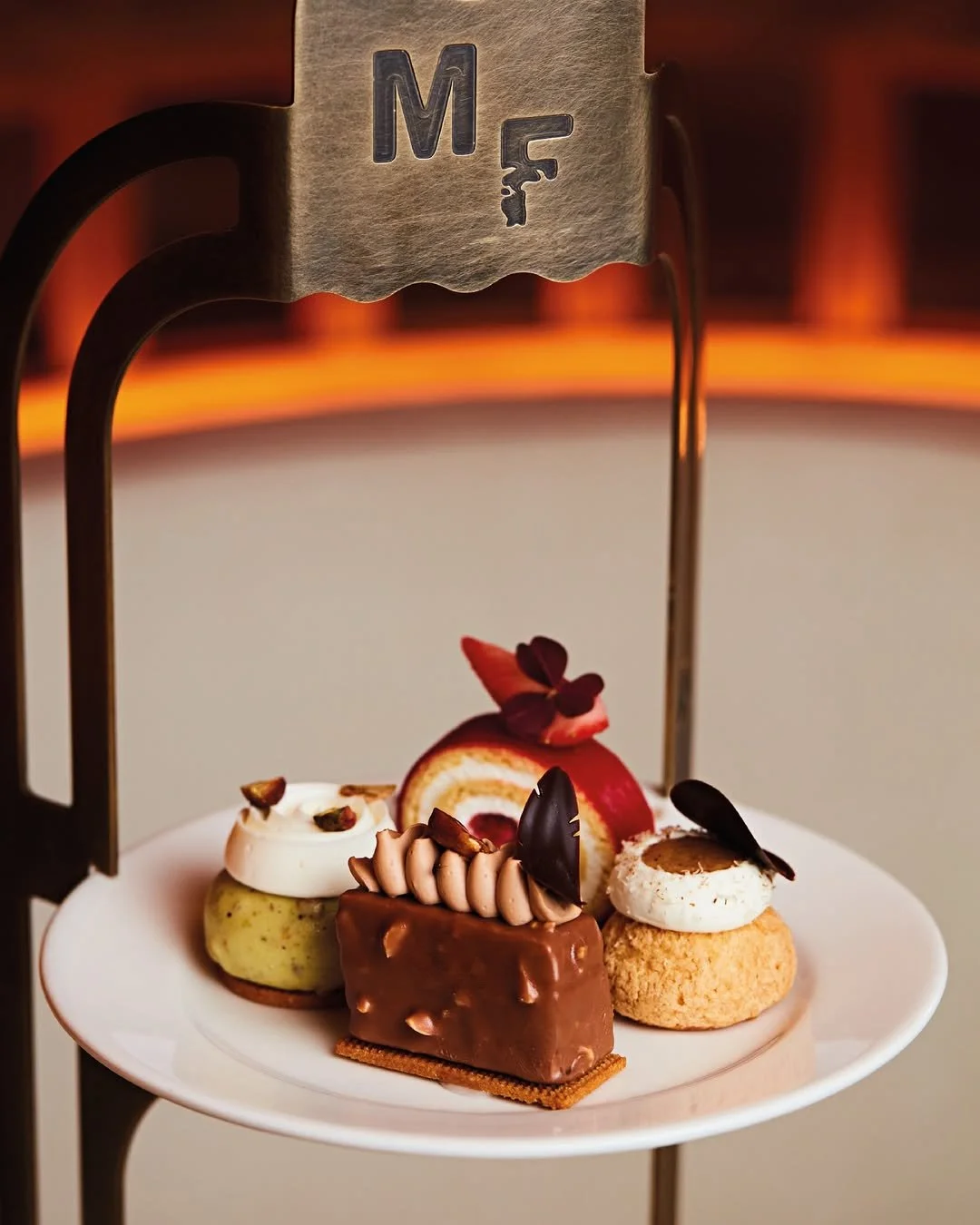 A closer look at the bespoke afternoon tea stand we designed and created for the team at Maison Fran&ccedil;ois ✨ 

We engraved their distinctive 'MF' logo onto the brass frame which was then antiqued and waxed to give it this beautiful finish.

Our 