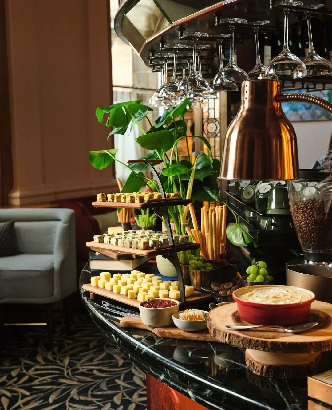 A lovely shot of the bespoke, three-tiered cantilever stand we designed and created for the team at Gleneagles Townhouse ✨ 

Featuring a blackened steel and brass frame with removable boards made from American walnut, it was originally designed to se