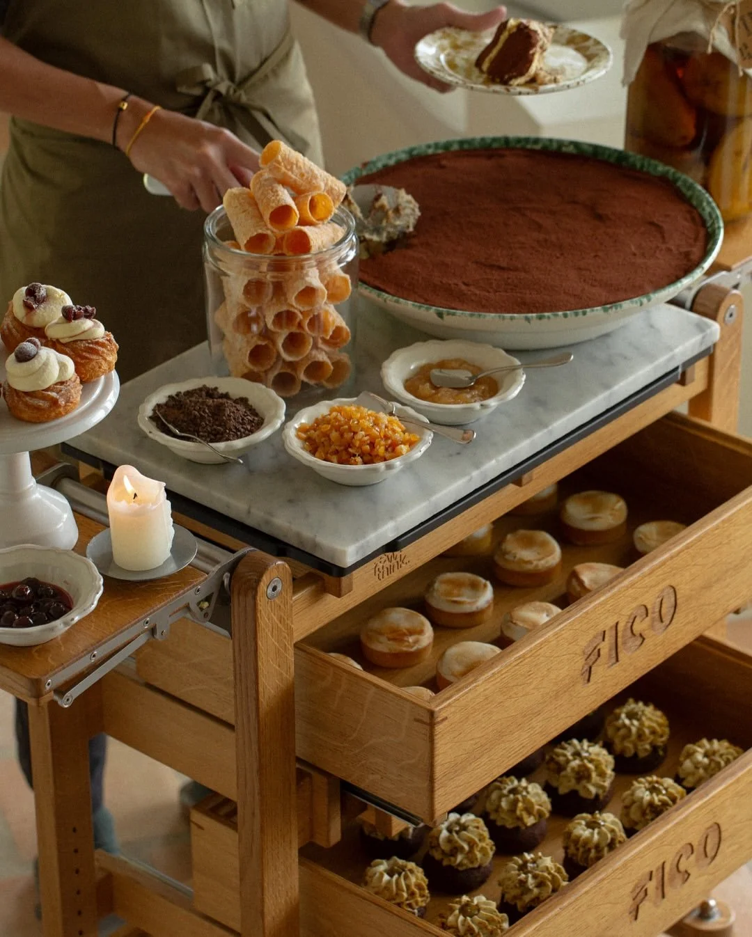 A perfect end to any meal: the dessert trolley at Fico ✨

Crafted from Italian marble, natural oak and stainless steel with a direct-to-timber logo, we designed it to be as functional as it is beautiful; easy to manoeuvre, accessible from all sides, 