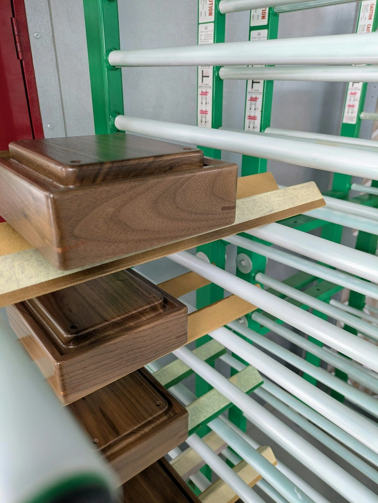 Bon-bon boxes for one of our bespoke trolleys, drying upside down in the @rewthink workshop after being finished with an eco-friendly plant-based wax oil 🍬🍃
