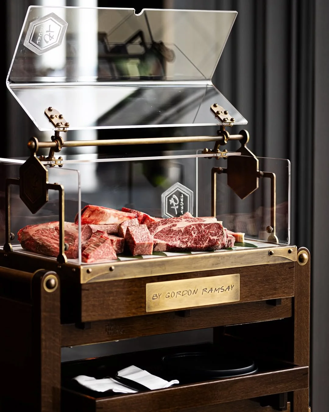 Another beautiful shot of the trolley we designed and created for the team at Lucky Cat by Gordon Ramsay ✨

Crafted from European oak and finished with a plant-based gloss, its removable sliding trays are on two-way runners, making them accessible fr