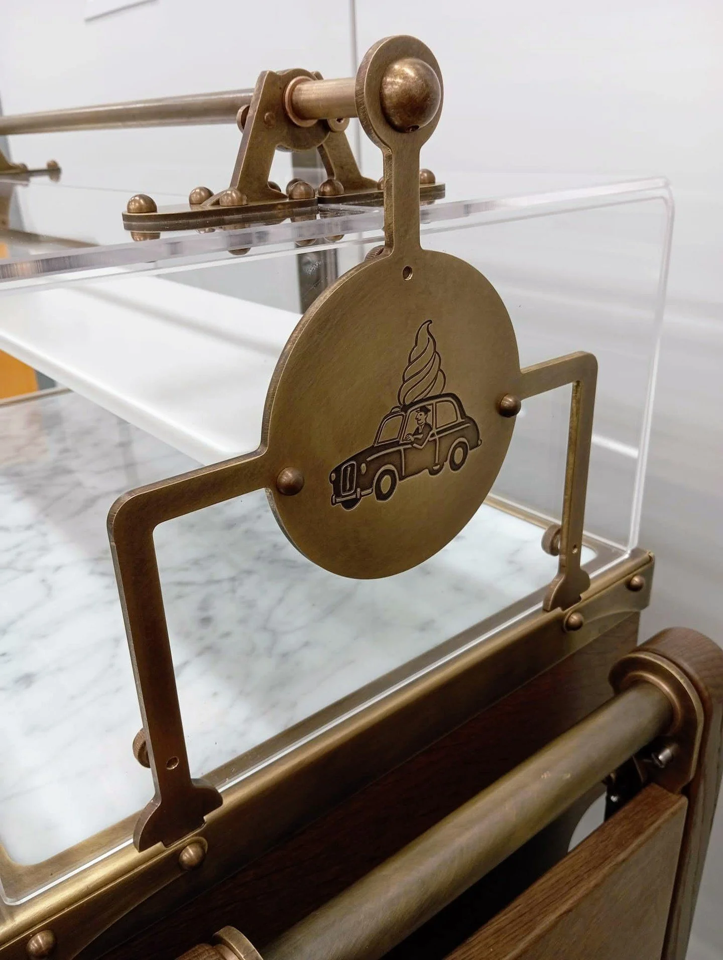 Bespoke engraving on antiqued brass for this special trolley ✨ 

Can you guess who we have designed and created this for?