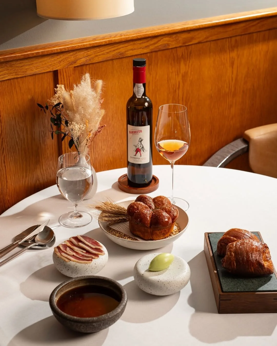 Bread and butter at Cail Bruich, featuring a bespoke @rewthink presentation box crafted from fumed European oak and Cumbrian stone.

Highly regarded for its beauty, strength and natural water resistance, Cumbrian stone offers the perfect blend of dur