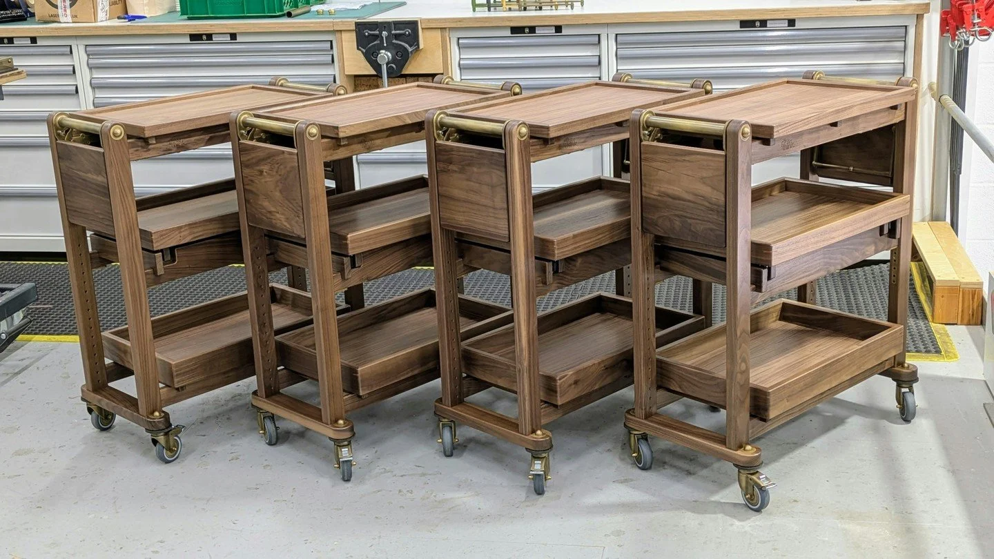 In the workshop: a fleet of gueridon trolleys, crafted from sustainable American walnut.

We love how this line-up shows the beautifully unique grain patterns and tones in each piece of timber that mean no @rewthink two items are ever exactly the sam