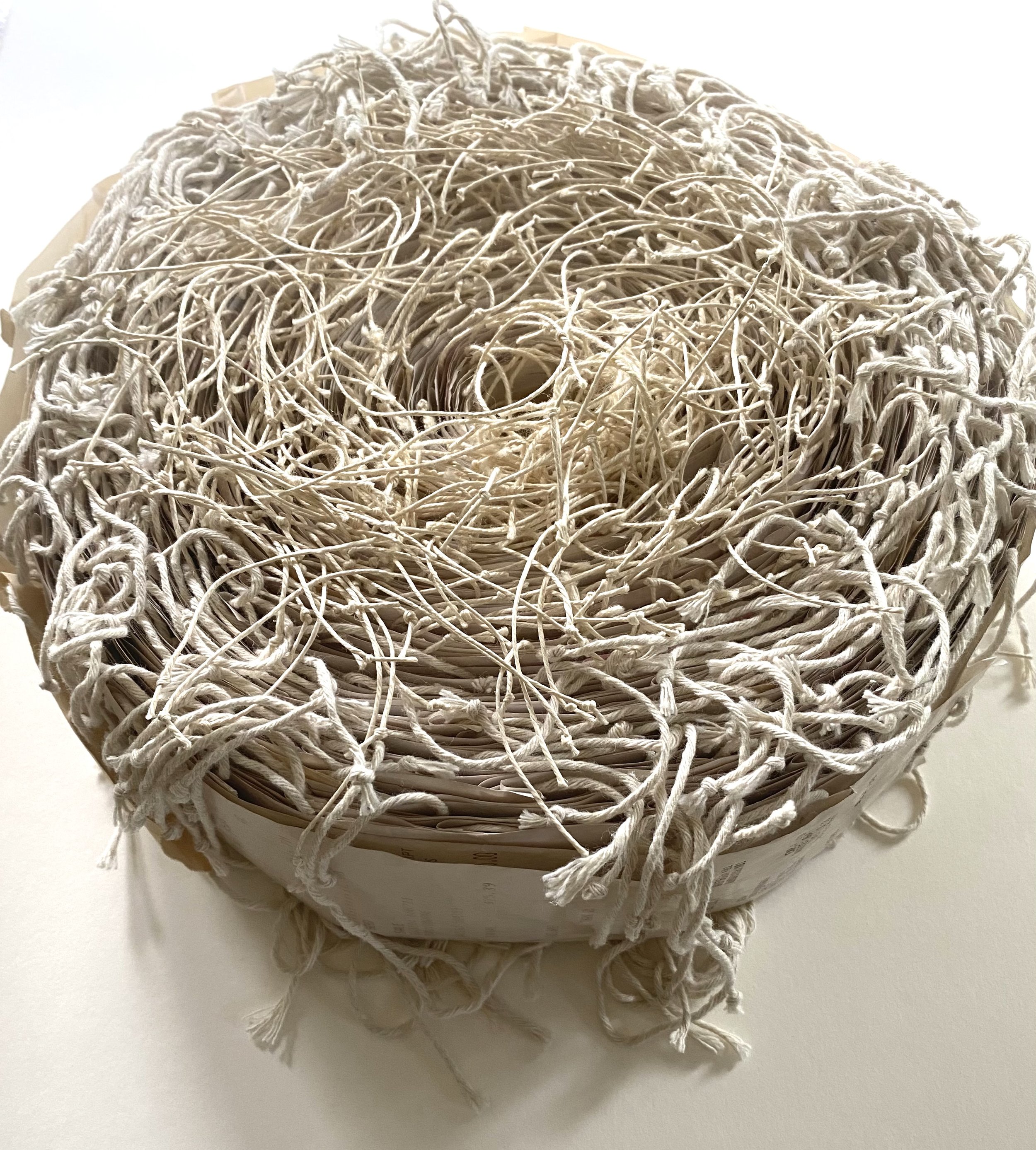 Gail Barker . Receipts II 2012 . Paper, twine, linen thread. 12" diameter x 3" . $500