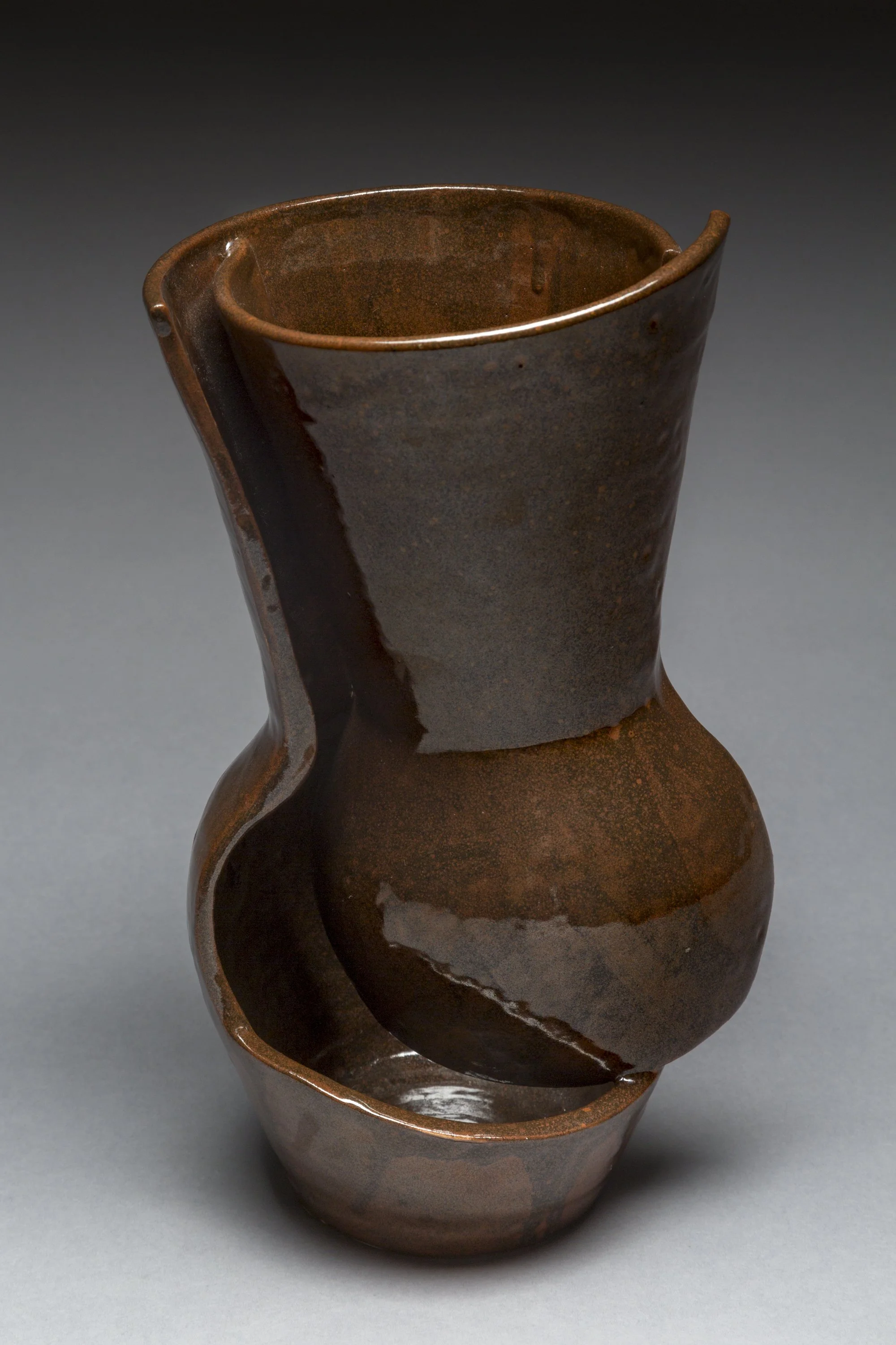 Danette English . Iron Vase 2024 . Ceramic . 18” x 6” x 6”
