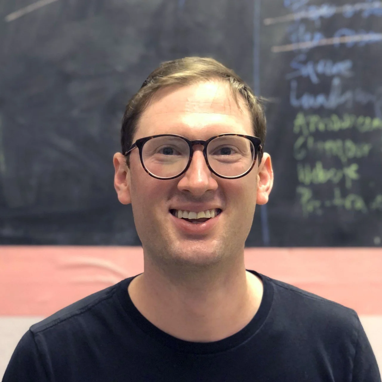 Headshot of Ben Guzick