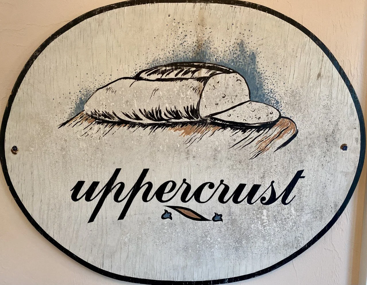 Uppercrust Business Sign