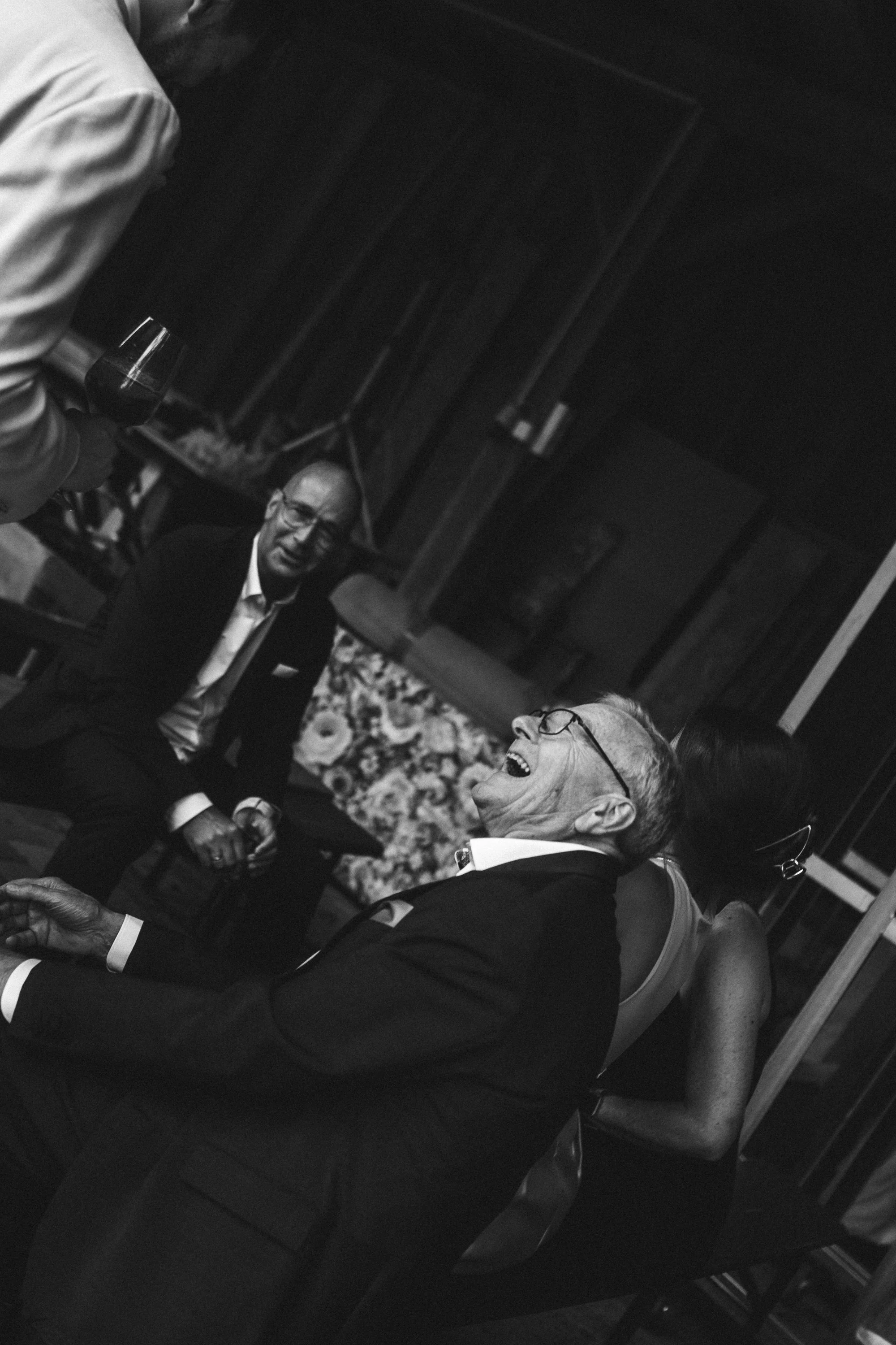 Candid wedding moment photographed in a documentary style, focusing on real emotion and atmosphere.