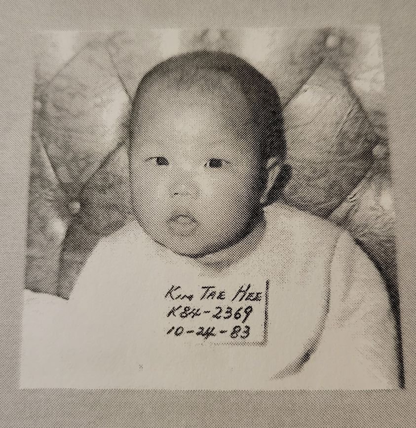 My first photo shoot. Me at approximately 7 months old when I was relinquished to Holt Adoption Agency in Mokpo, South Korea. The numbers stand for "Korea 1984: 2369th baby taken into custody for adoption that year" + my birthday