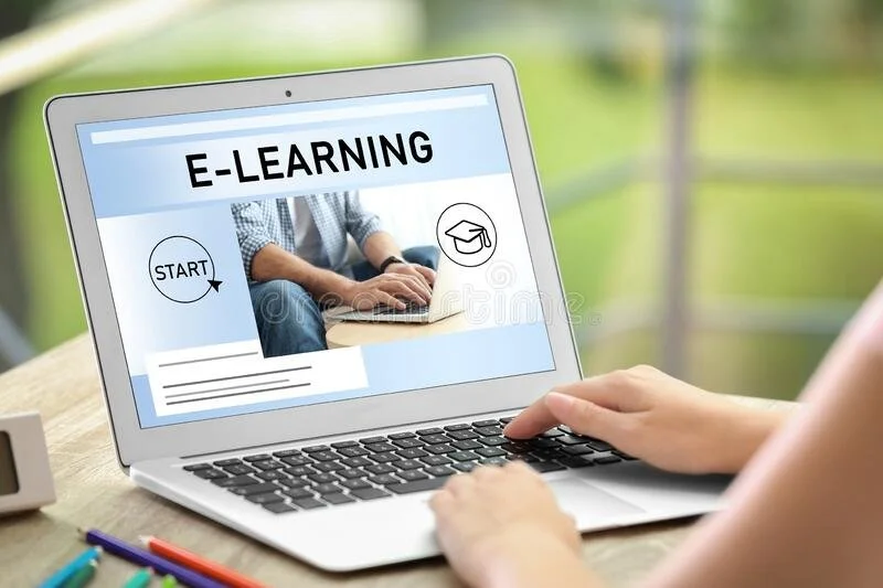 Laptop screen displaying an e-learning platform with a person using it to study online.