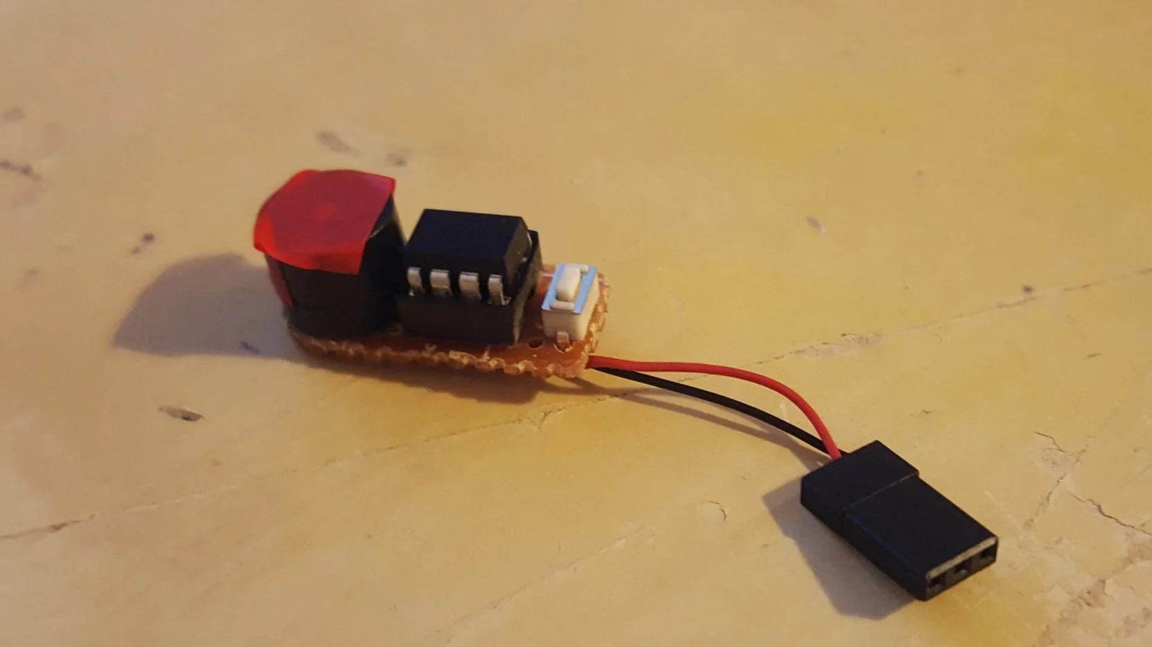 (2016) A low battery audible alert for a small remote control glider. Uses an ATTiny mcu to measure battery voltage and trigger a piezo alarm when below a threshold.