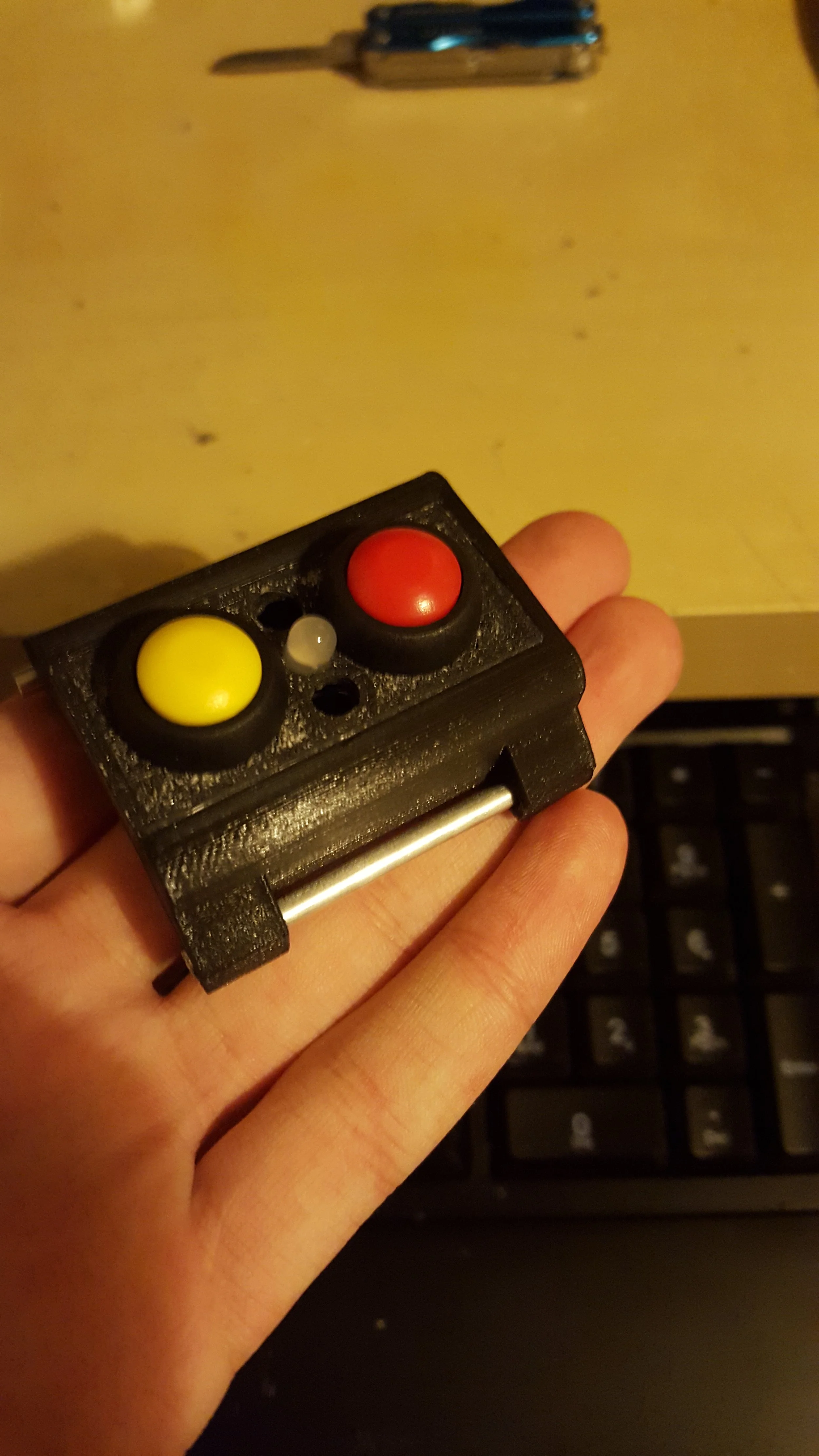 The finished watch housing awaiting wiring. It has two momentary push buttons and 3 LEDs.