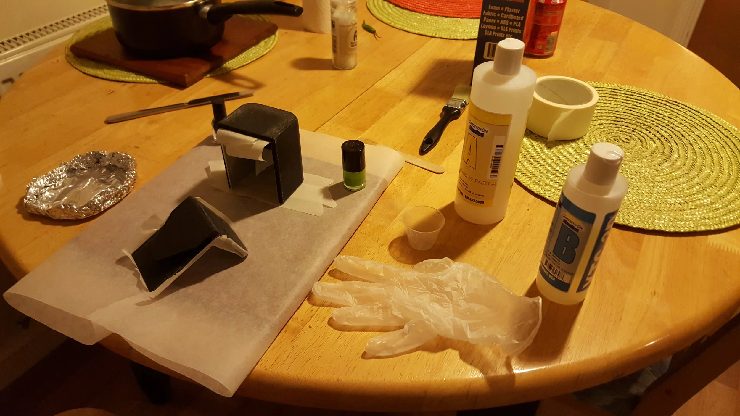 To improve the surface finish of the parts, I coated them with epoxy and sanded them down.