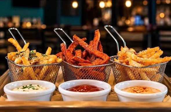 Fry Flight with dipping sauces