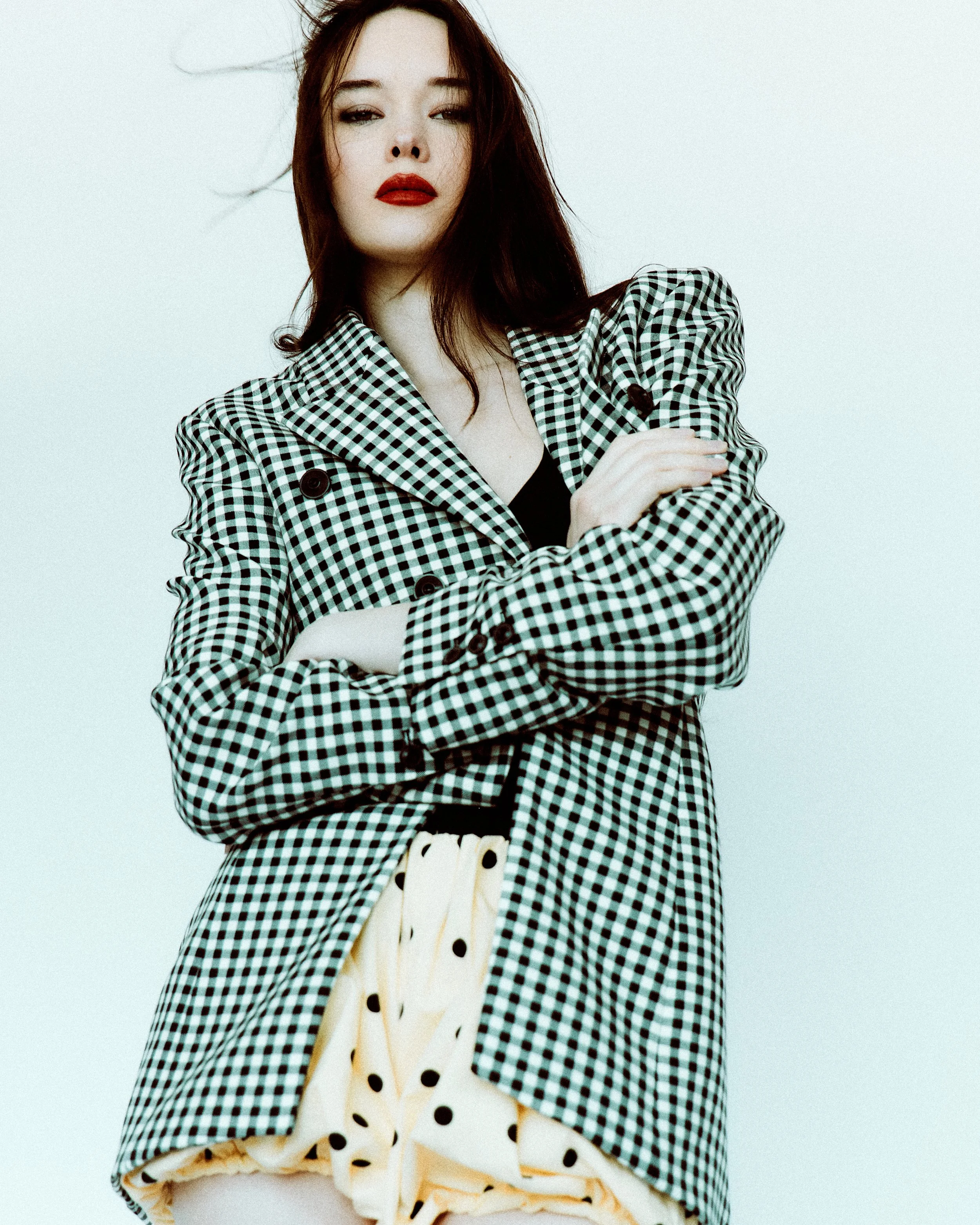 editorial fashion shoot with bold red lip and blazer using 100% clean beauty makeup products in NYC