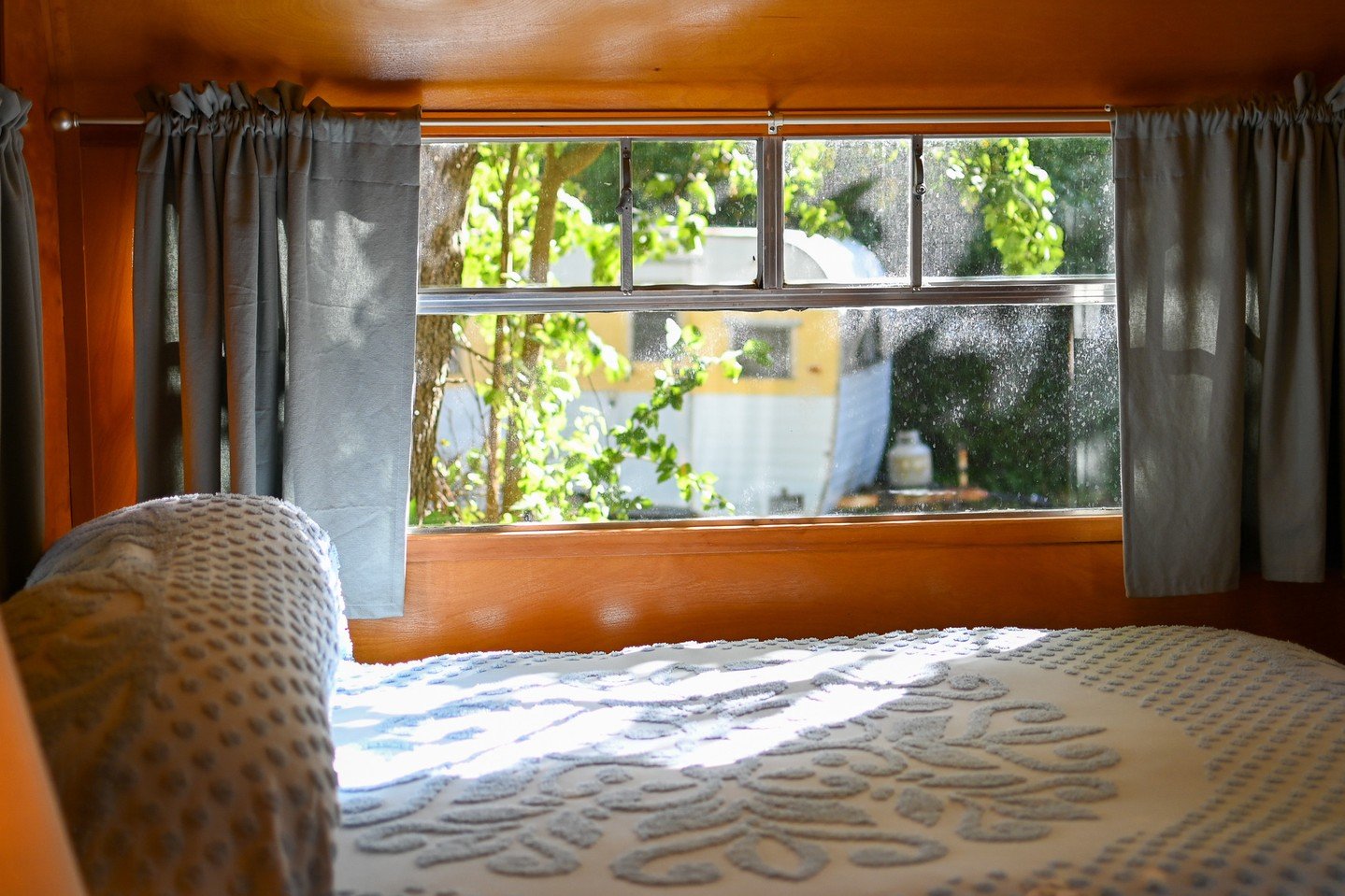 Meet Felicity, one of our newest minimalist trailers. Light-filled, spacious, and wrapped in warm birch paneling, it is a peaceful place to stretch out, create, rest, or simply breathe.

Our minimalist stays are pared back in the best way. A comfy be