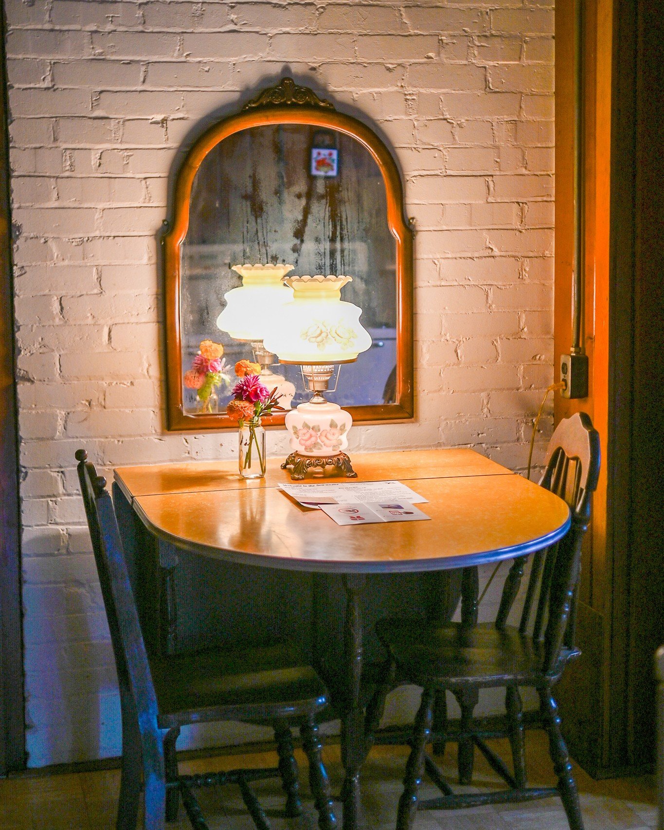 Welcome to the Balcony Suite. Tucked on the second floor of the Main Lodge, this bright one-bedroom retreat offers the rare treat of private access to the shared balcony.

A high queen bed and cozy daybed. An antique writing desk for morning journali