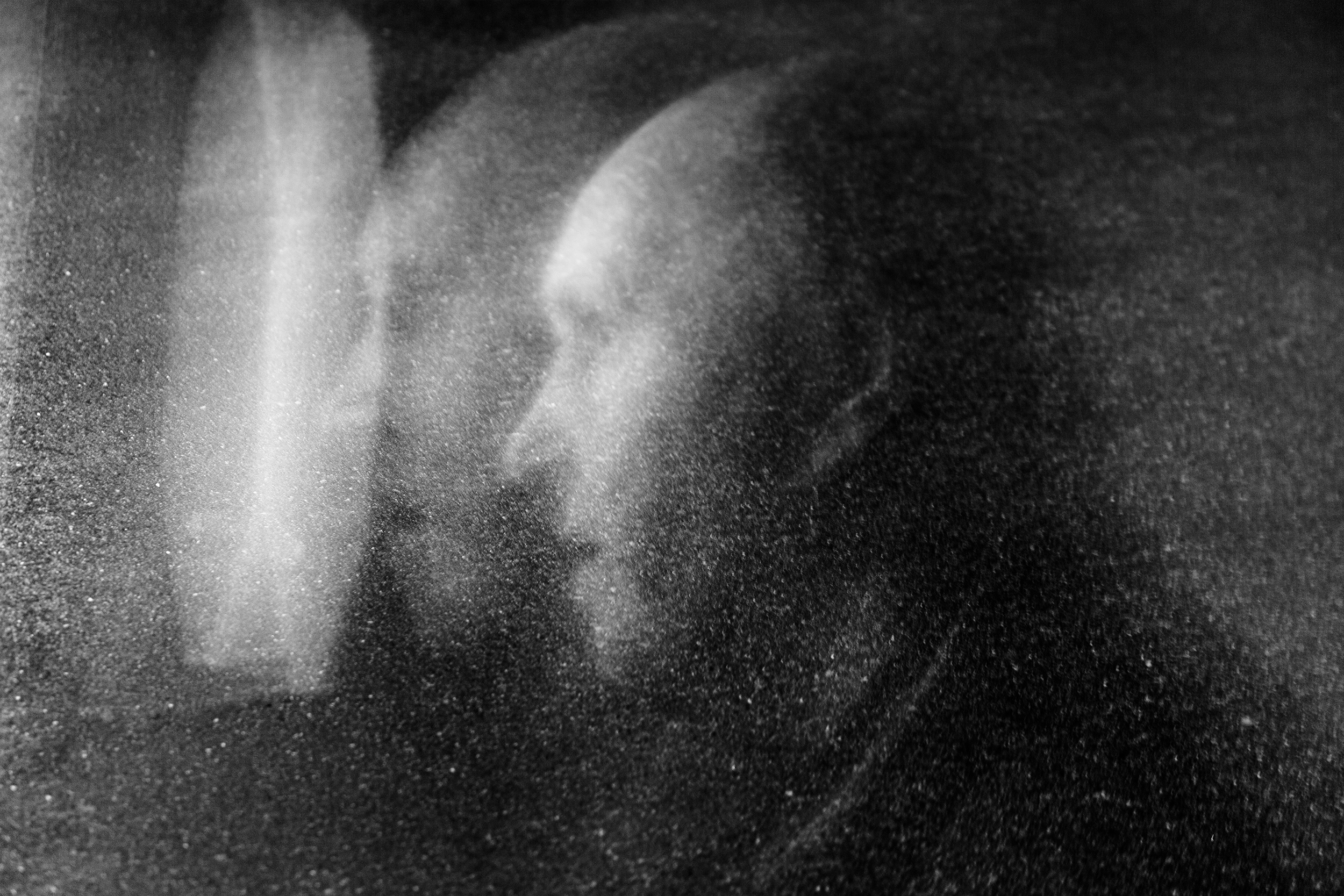 "Lost In Space" street portrait with cosmic, weightless feel as if walking in space. In-camera double exposure. Shot in Helsinki, Finland by Oscar Wollsten.