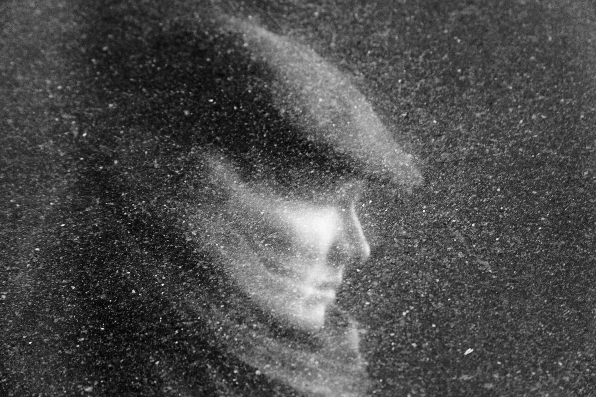 "Lost In Space" street portrait with cosmic, weightless feel as if walking in space. In-camera double exposure. Shot in Helsinki, Finland by Oscar Wollsten.