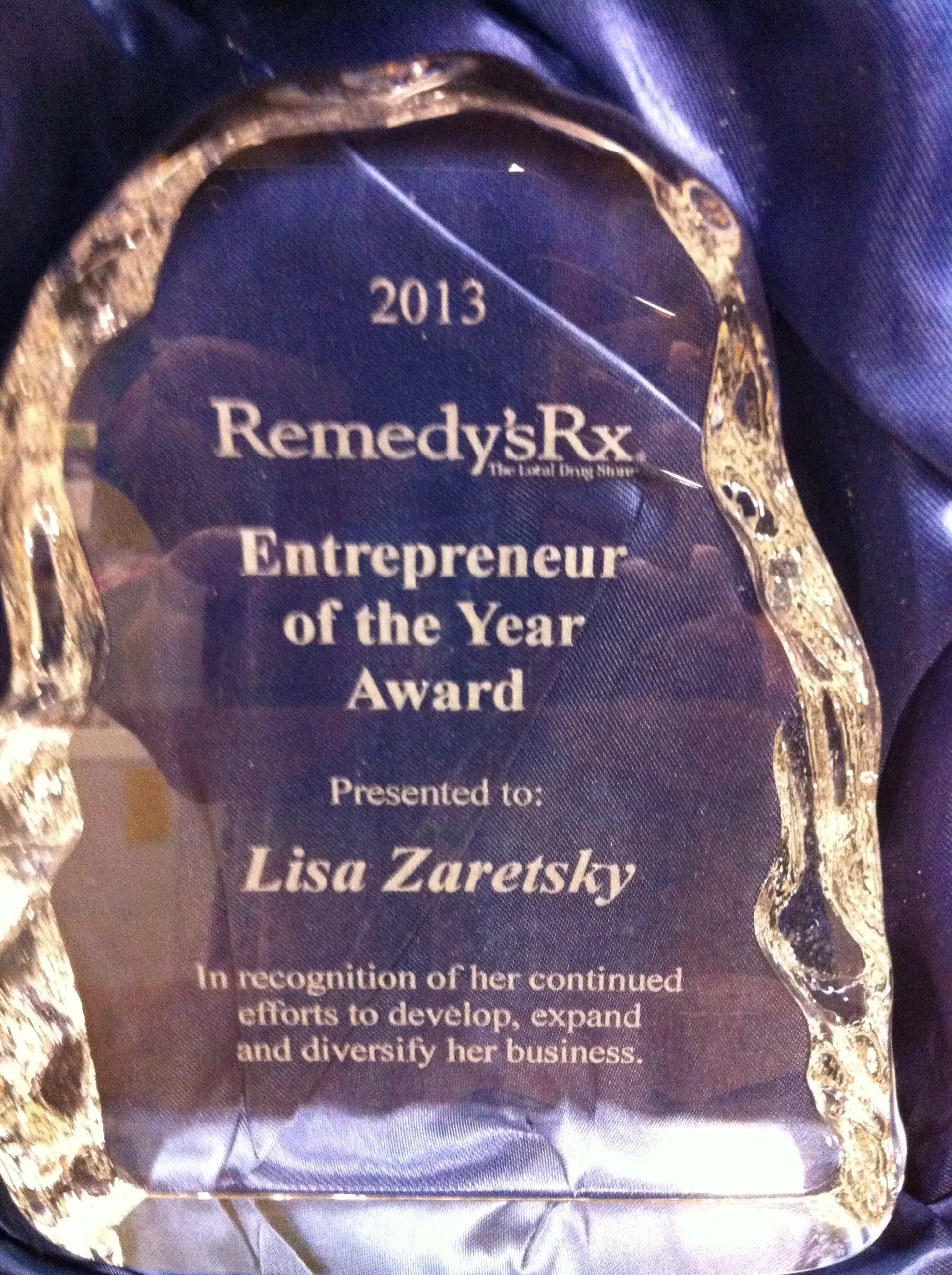 Entrepreneur of the Year Award in recognition of Dr. Lisa's continued efforts to develop, expand, and diversify her business. Awarded - 2013.