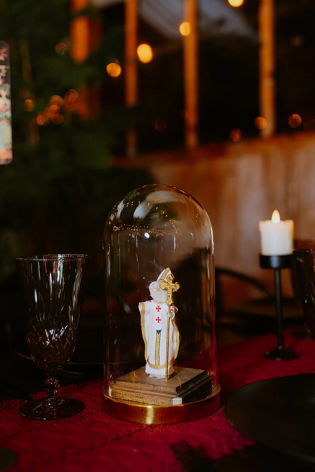 Unique non-traditional wedding decor idea — taxidermy cloche centerpiece at a moody Portland Oregon wedding