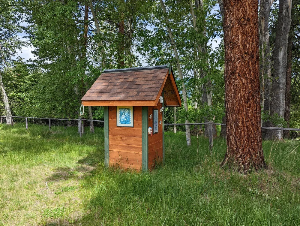  The public outhouse to the right 