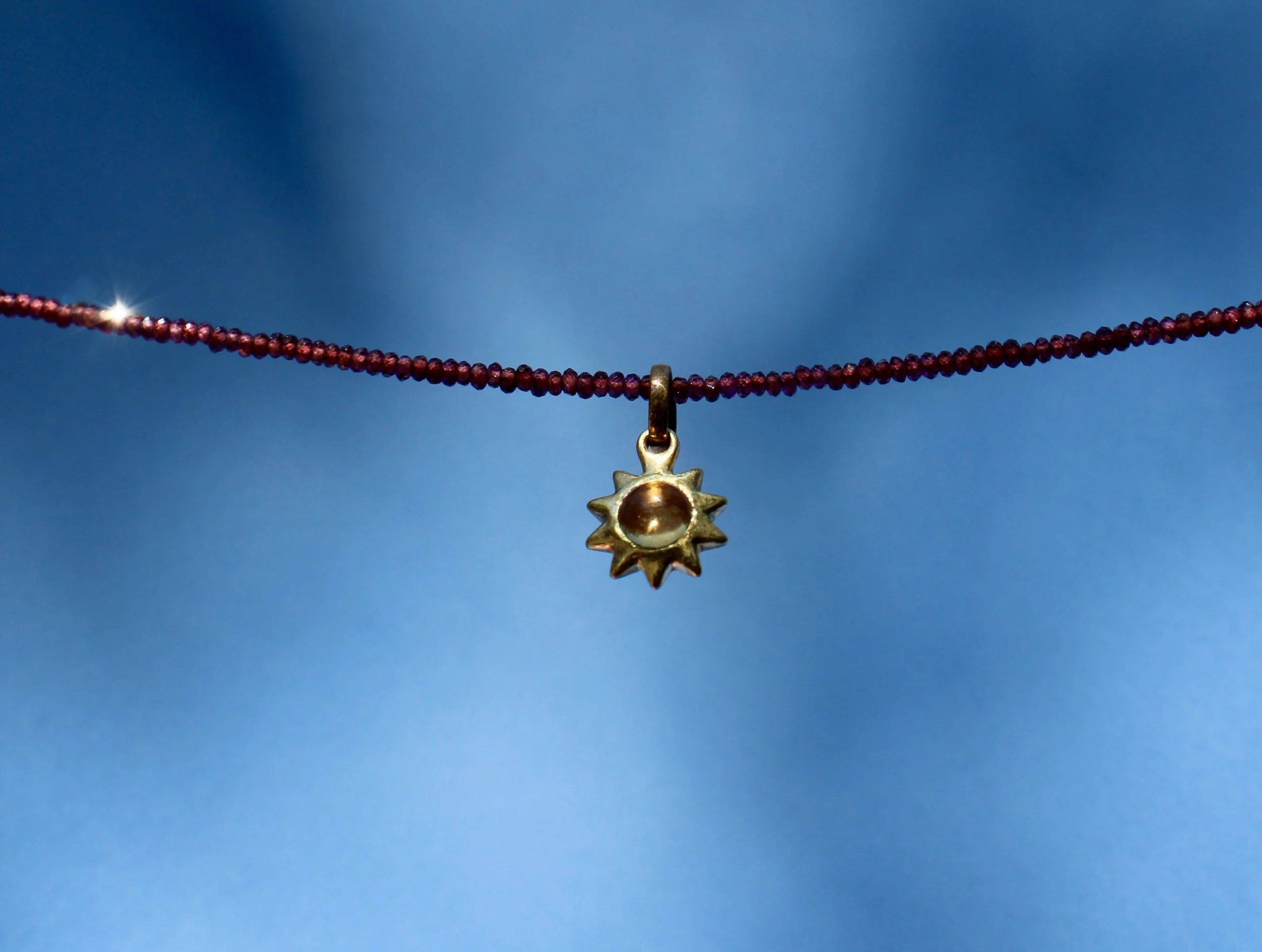 Brass Sun Charm