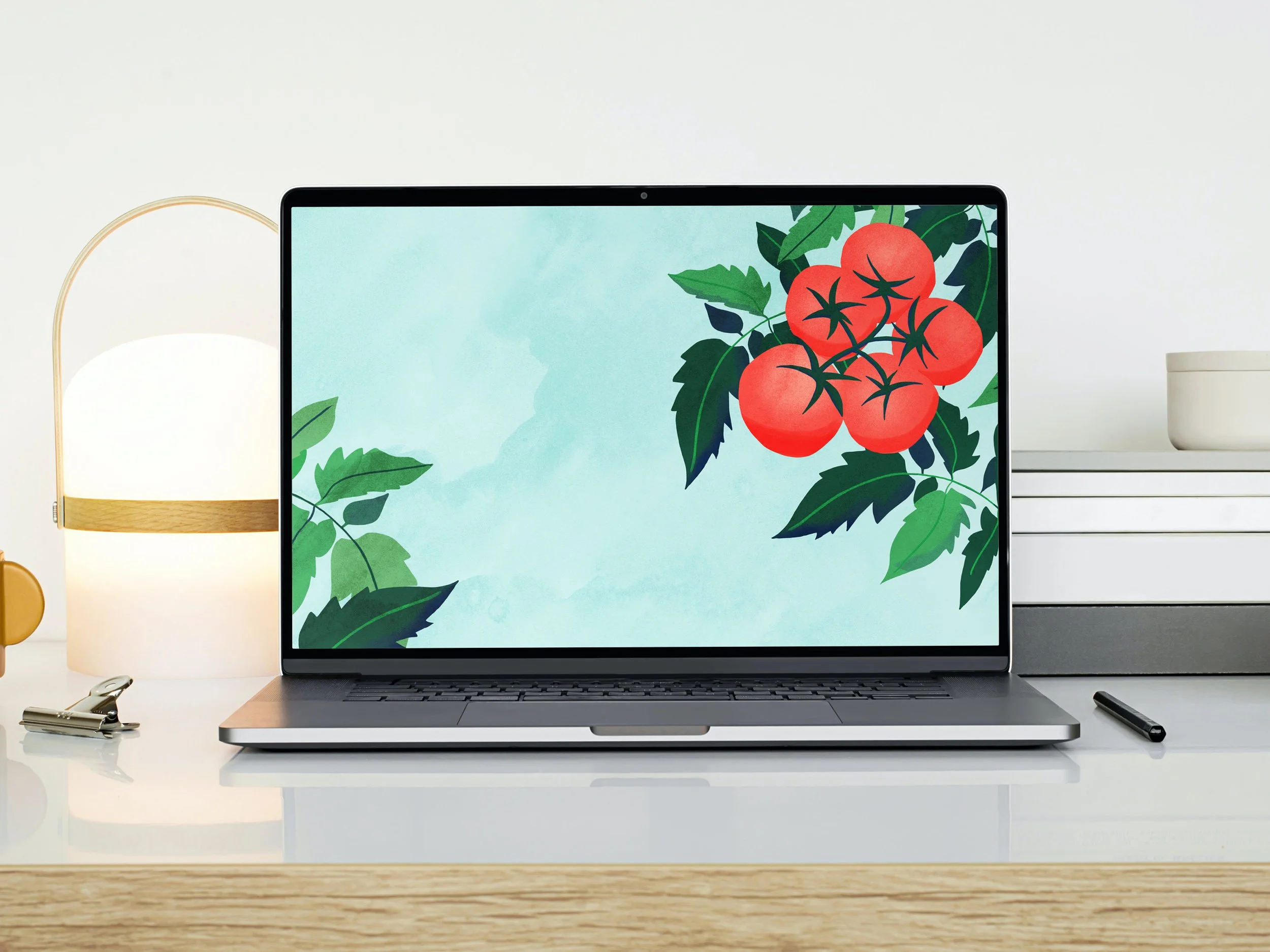 June illustrated wallpaper shown on a laptop