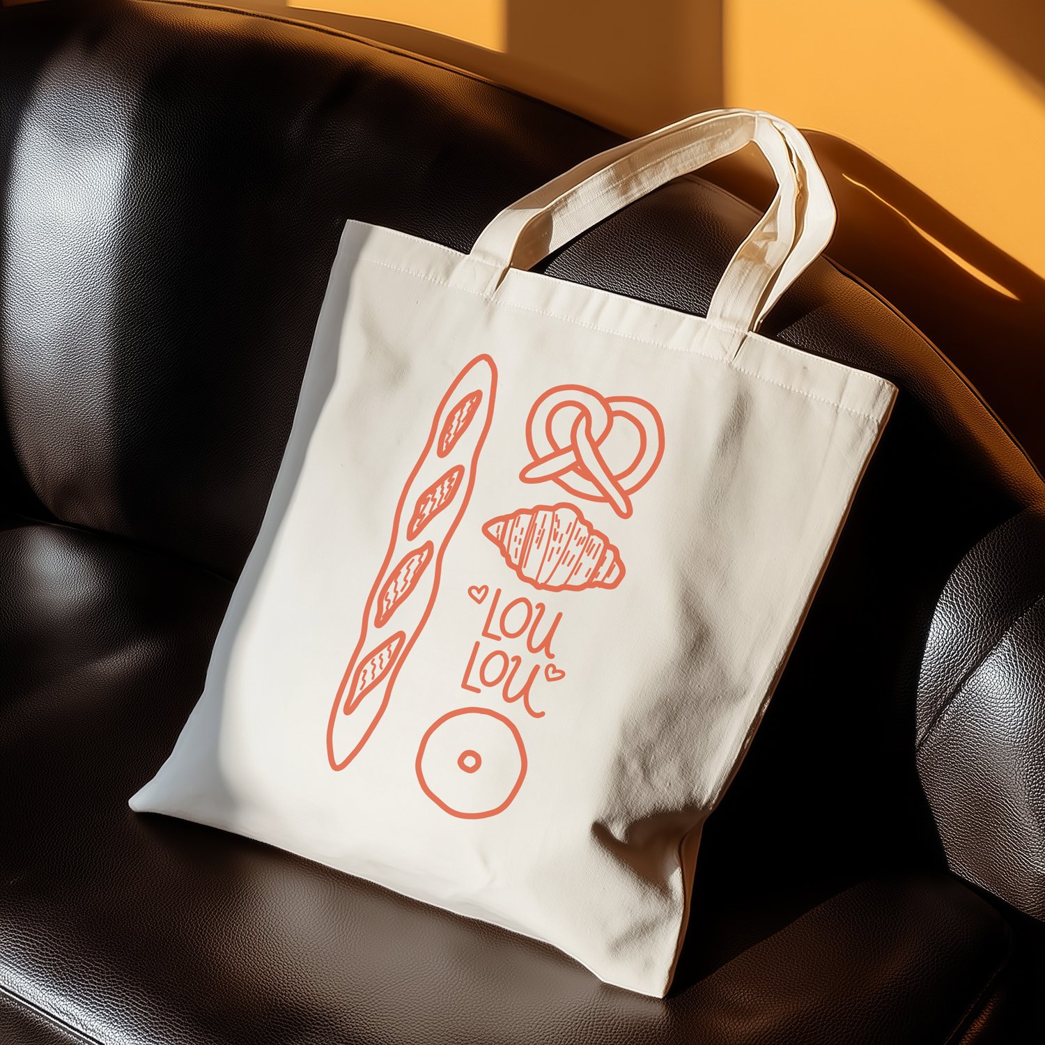 Illustrated logo for a bakery concept, shown on a tote bag