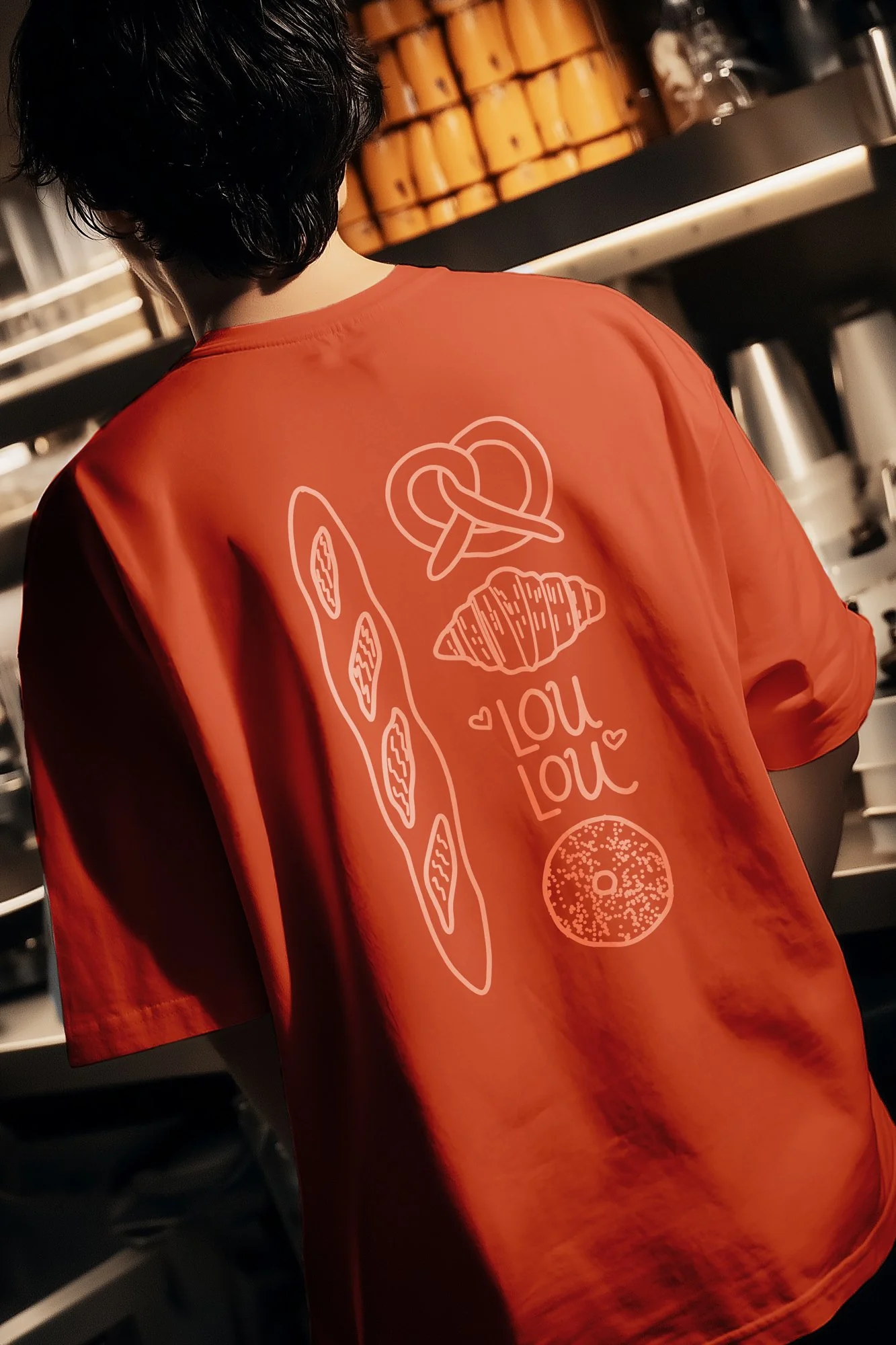 logo and custom illustration for a bakery concept, shown on a tshirt.