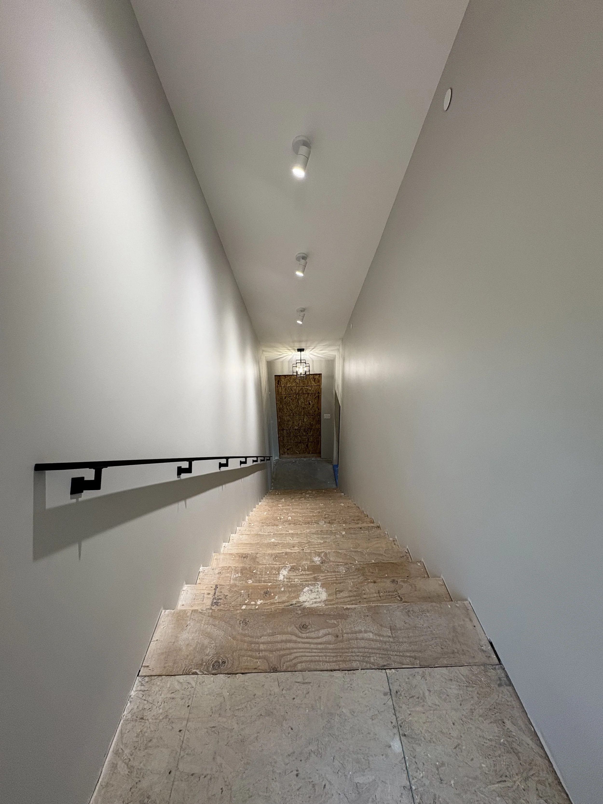 The bottom supports are installed under the railing. 