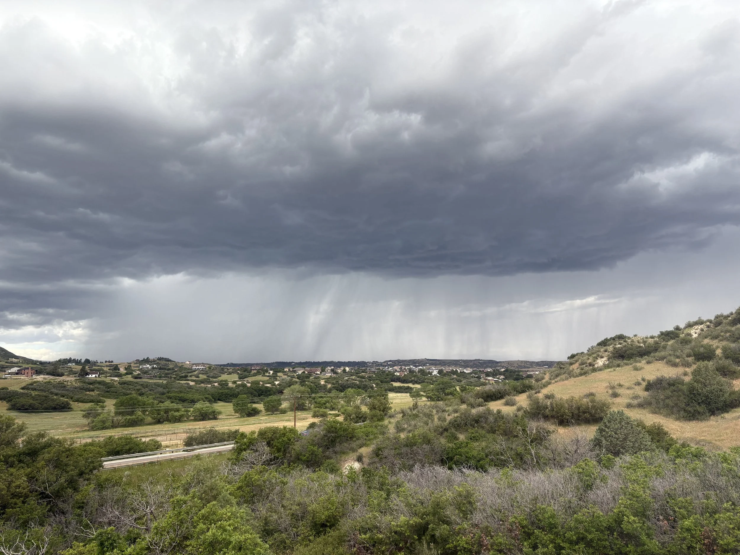 On cue, with any outdoor project, Mother Nature once again brews up a special treat for us! It does look cool as it moves in, but....
