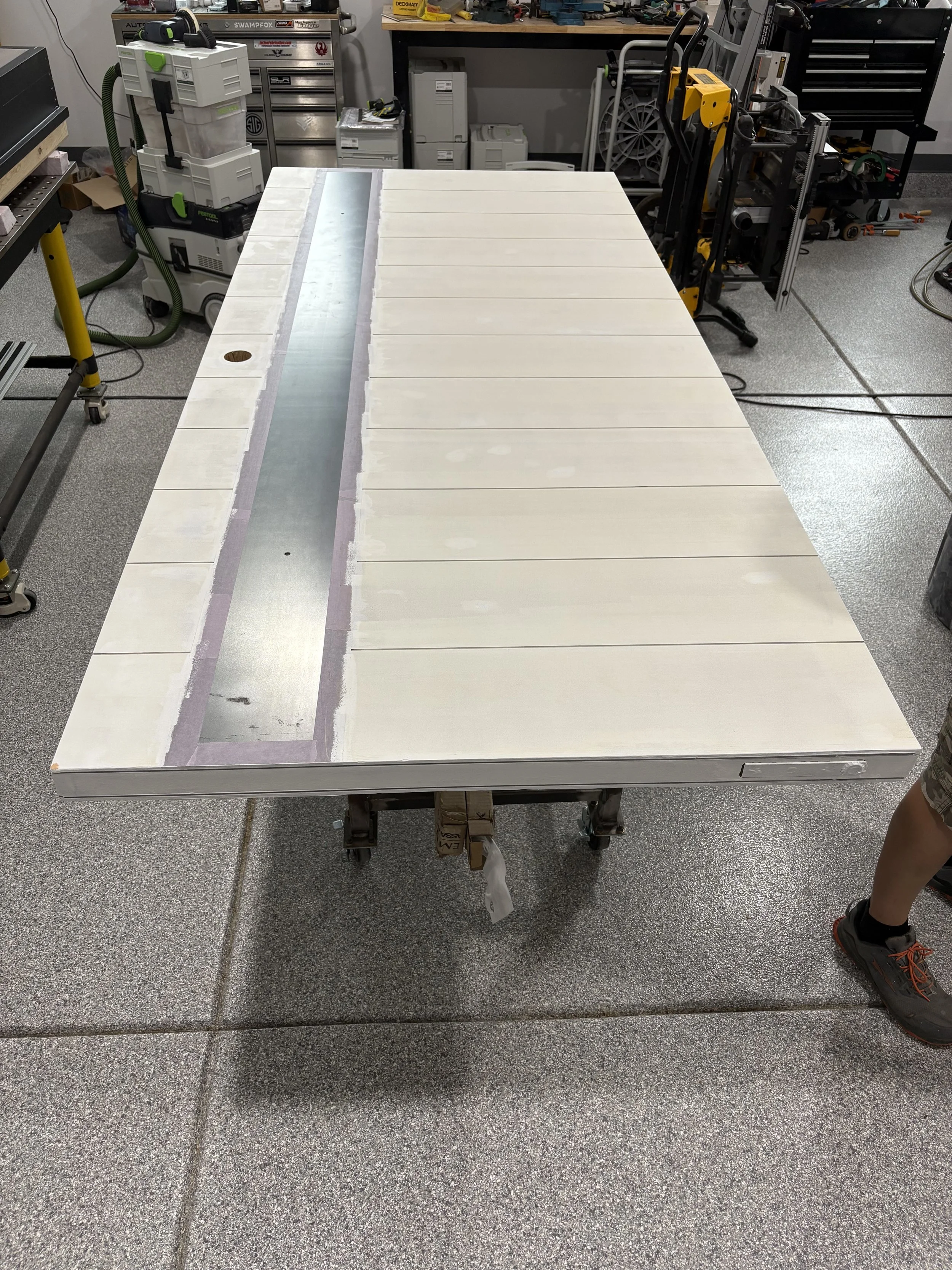 Here's the door with basic primer. We need to do a test fit before we put any kind of finishing layers on.