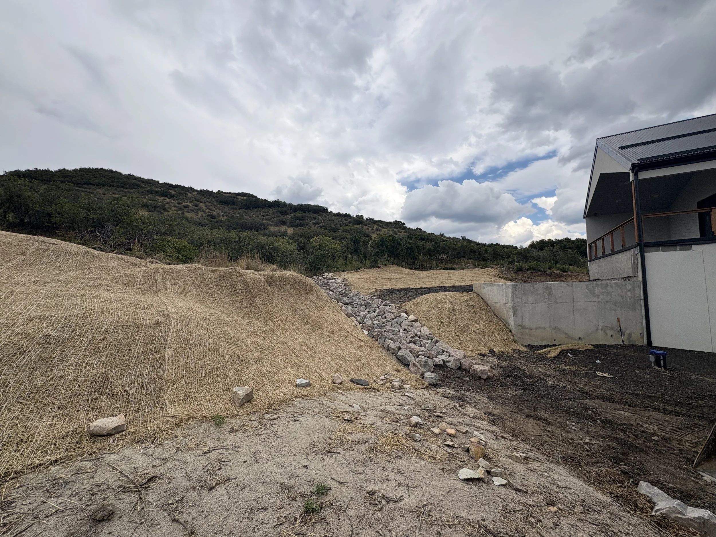 This is what happens when you build your house into a hill. You need a place for the water to go!