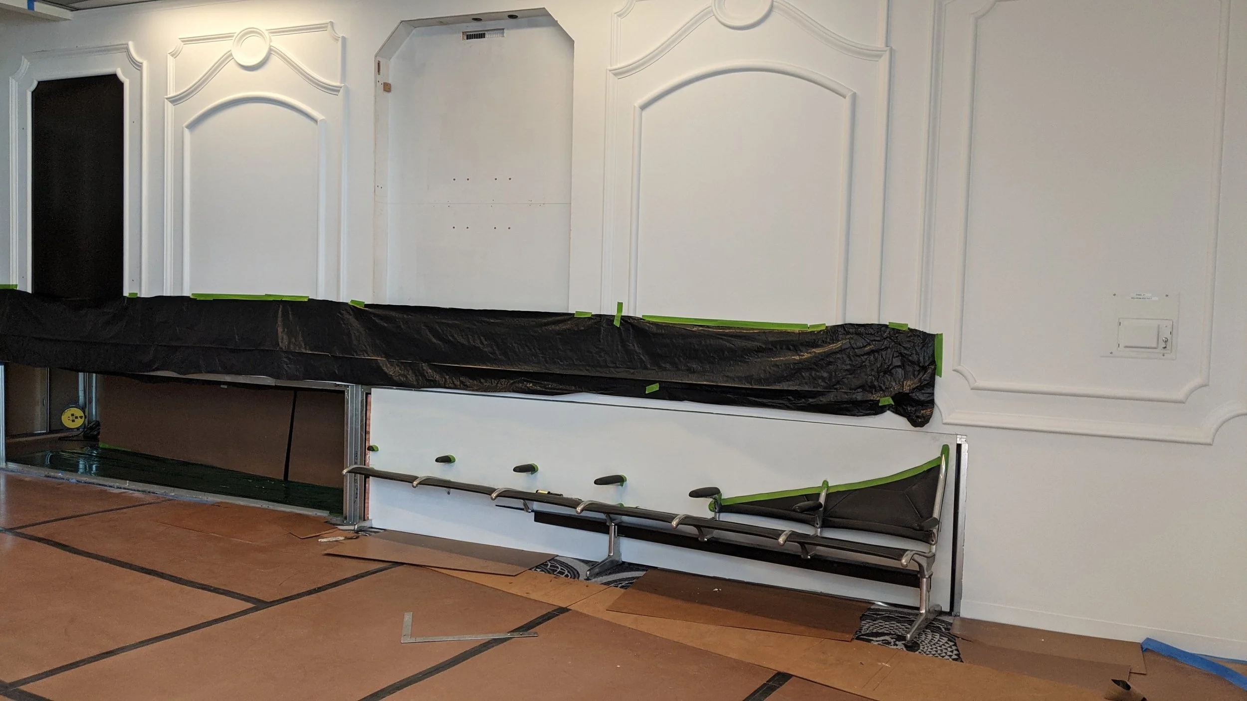 Test fit of our frame into custom wall onsite