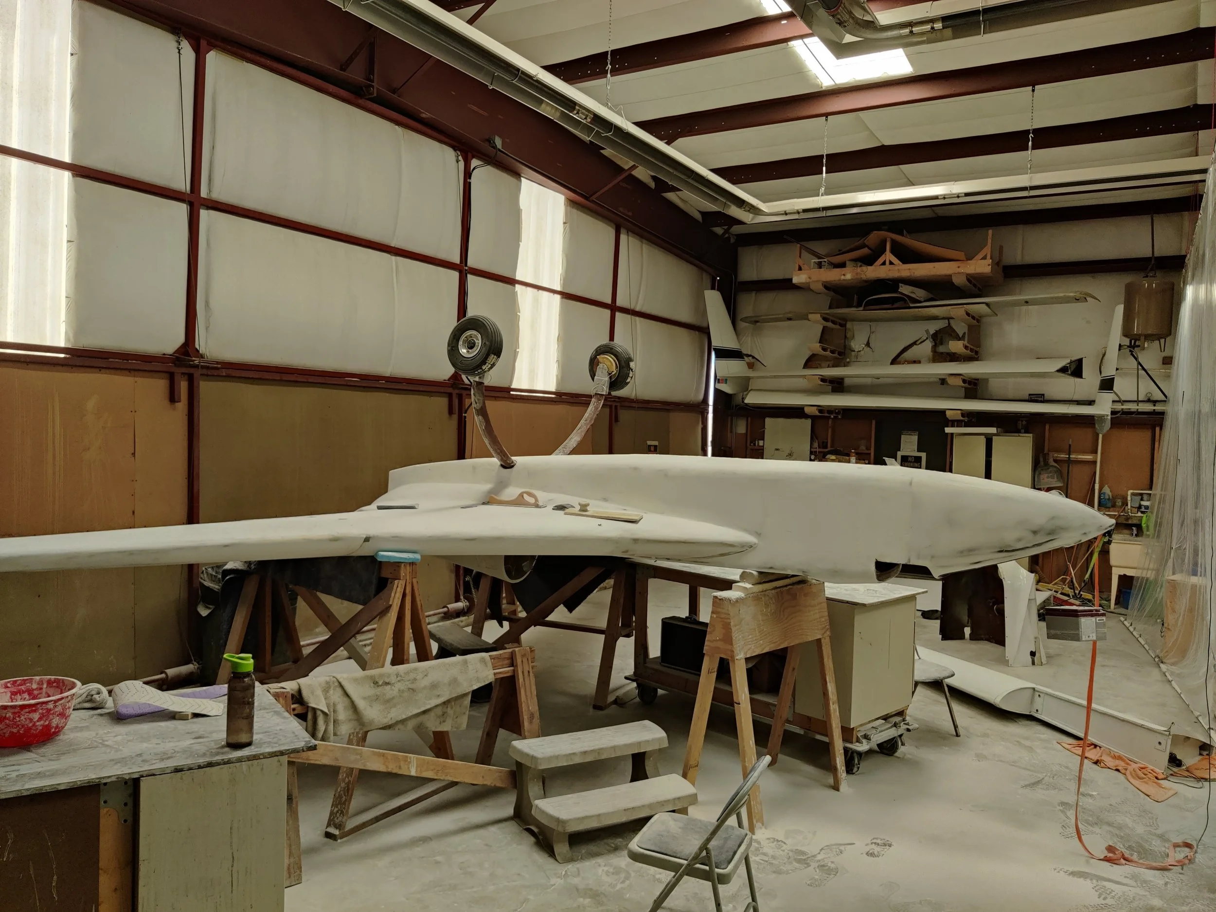 adding body filler and sanding it off for smoothness and aerodynamic efficiency