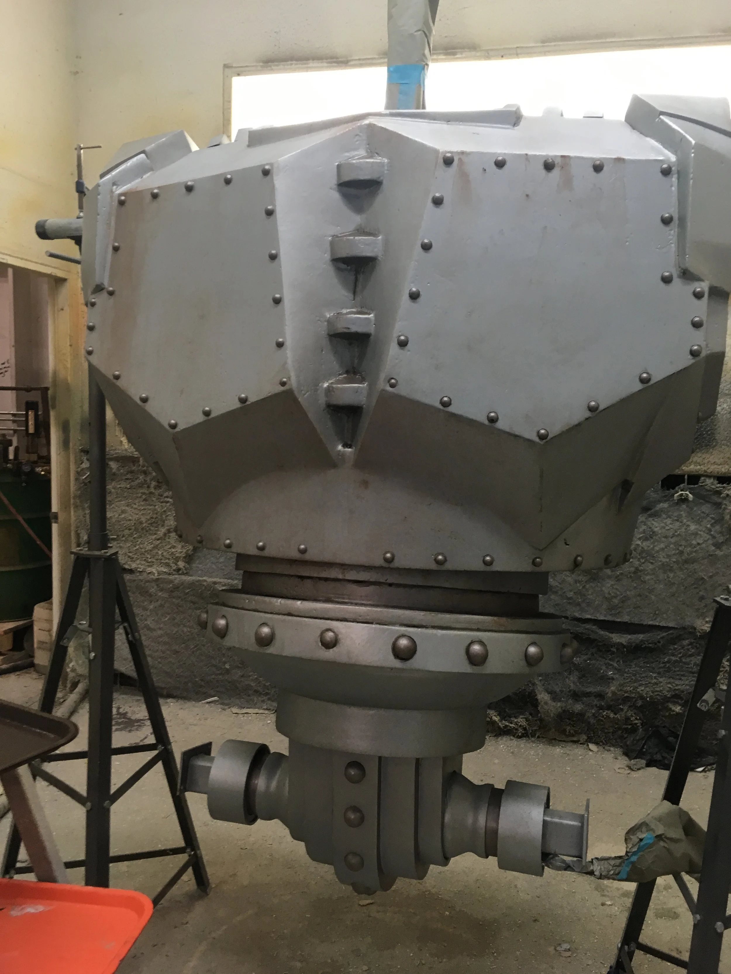 Torso made of milled EPS foam, HDU, and wood. Hardcoated and painted